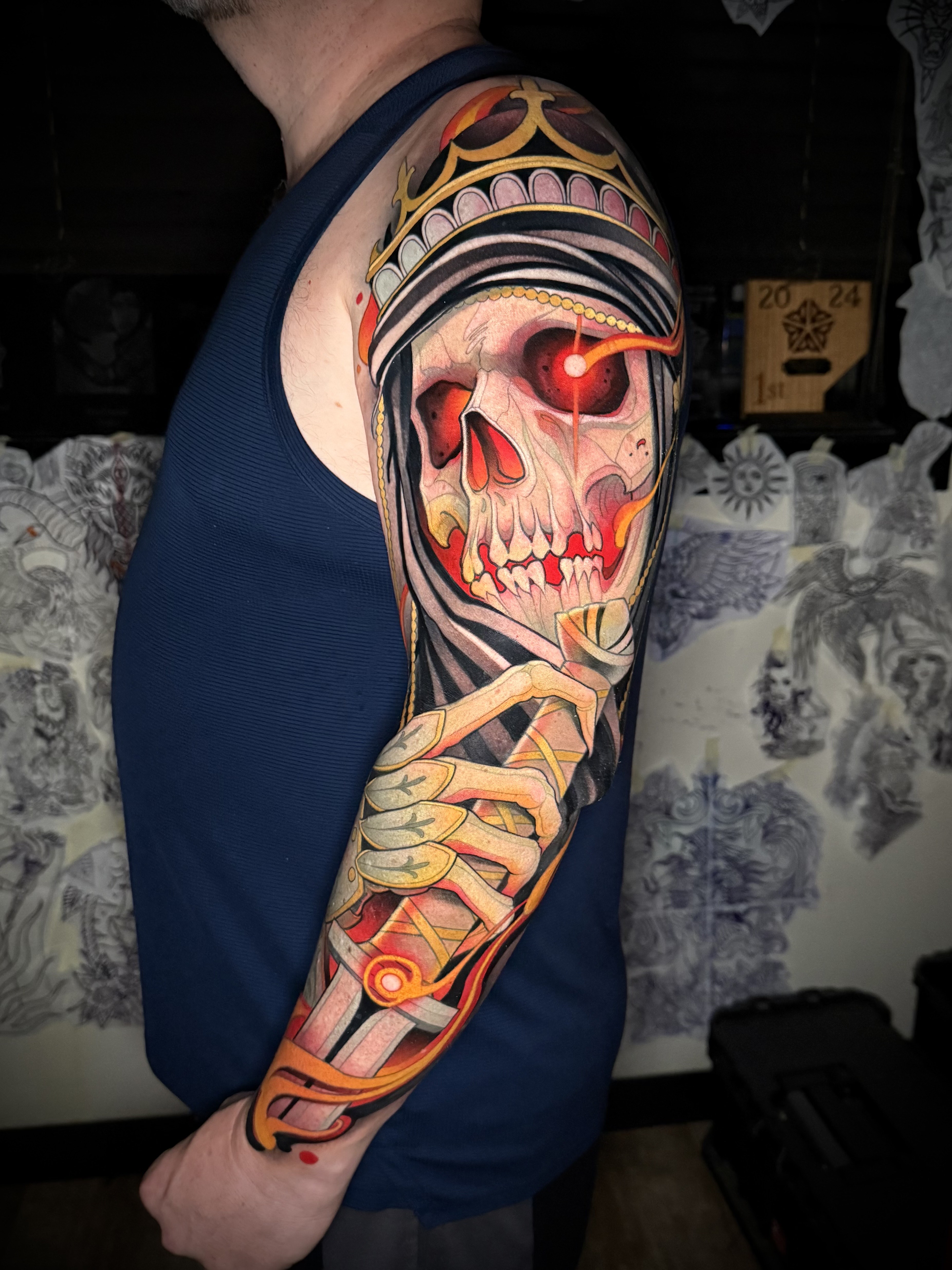 Healed color neo-traditional sleeve by Gian Karle, skull with golden crown, saturated reds and yellows, sharp lines, clean packing