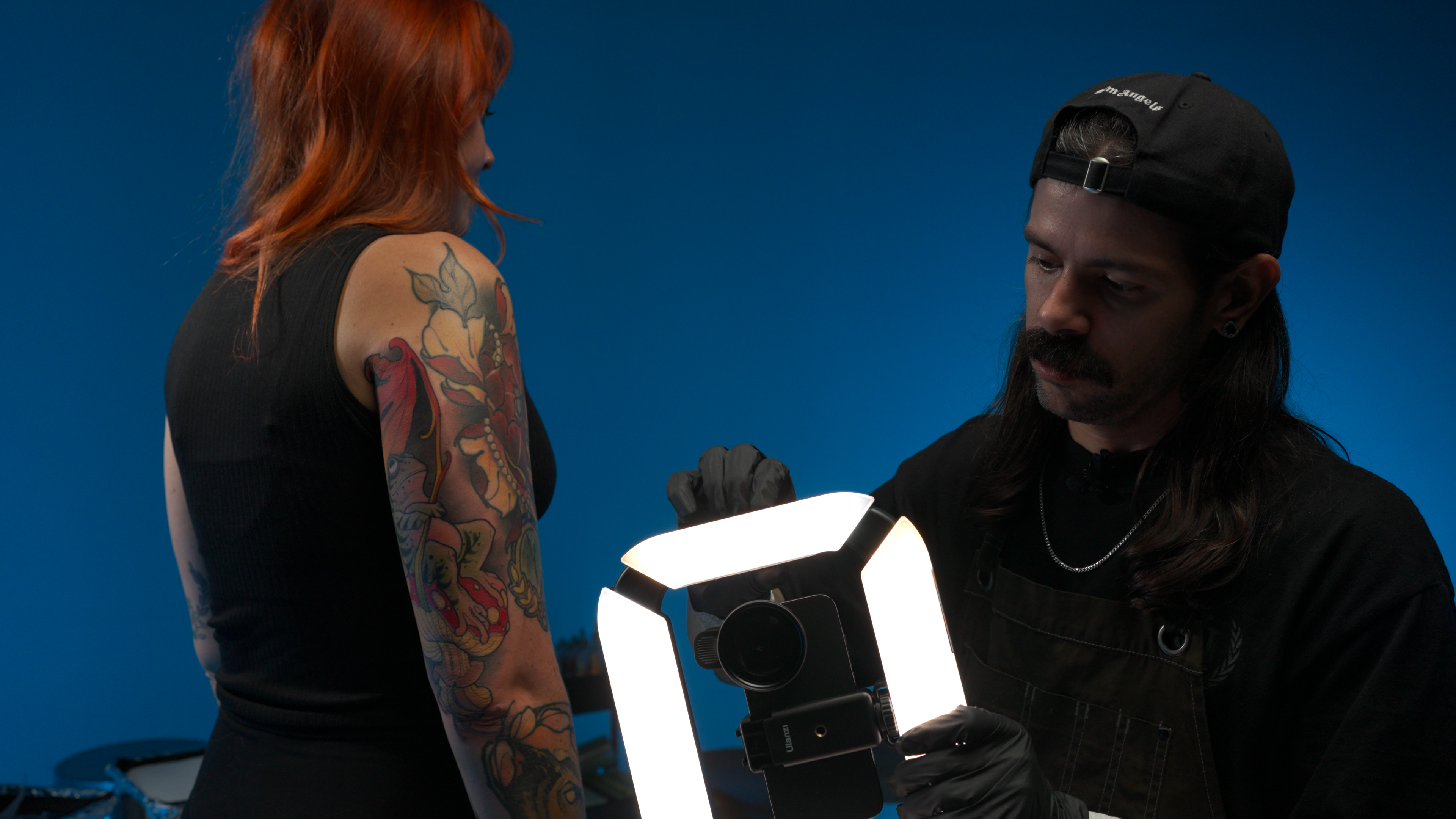 Gian setting up the polarizer and lighting rig for tattoo photography